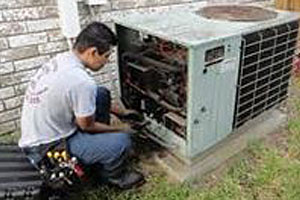 Man servicing central air